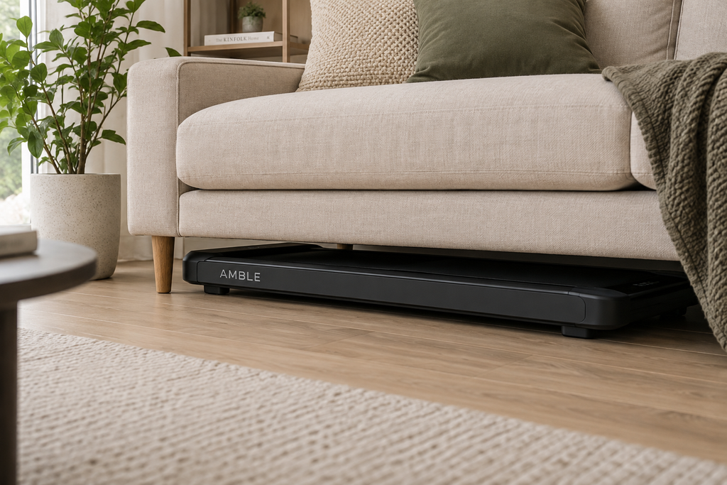 AMBLE Go walking treadmill stored flat under a sofa